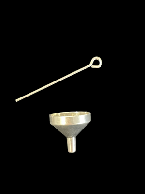 This silver funnel will help you place a small amount of your lost pets ashes into the heart pendant 