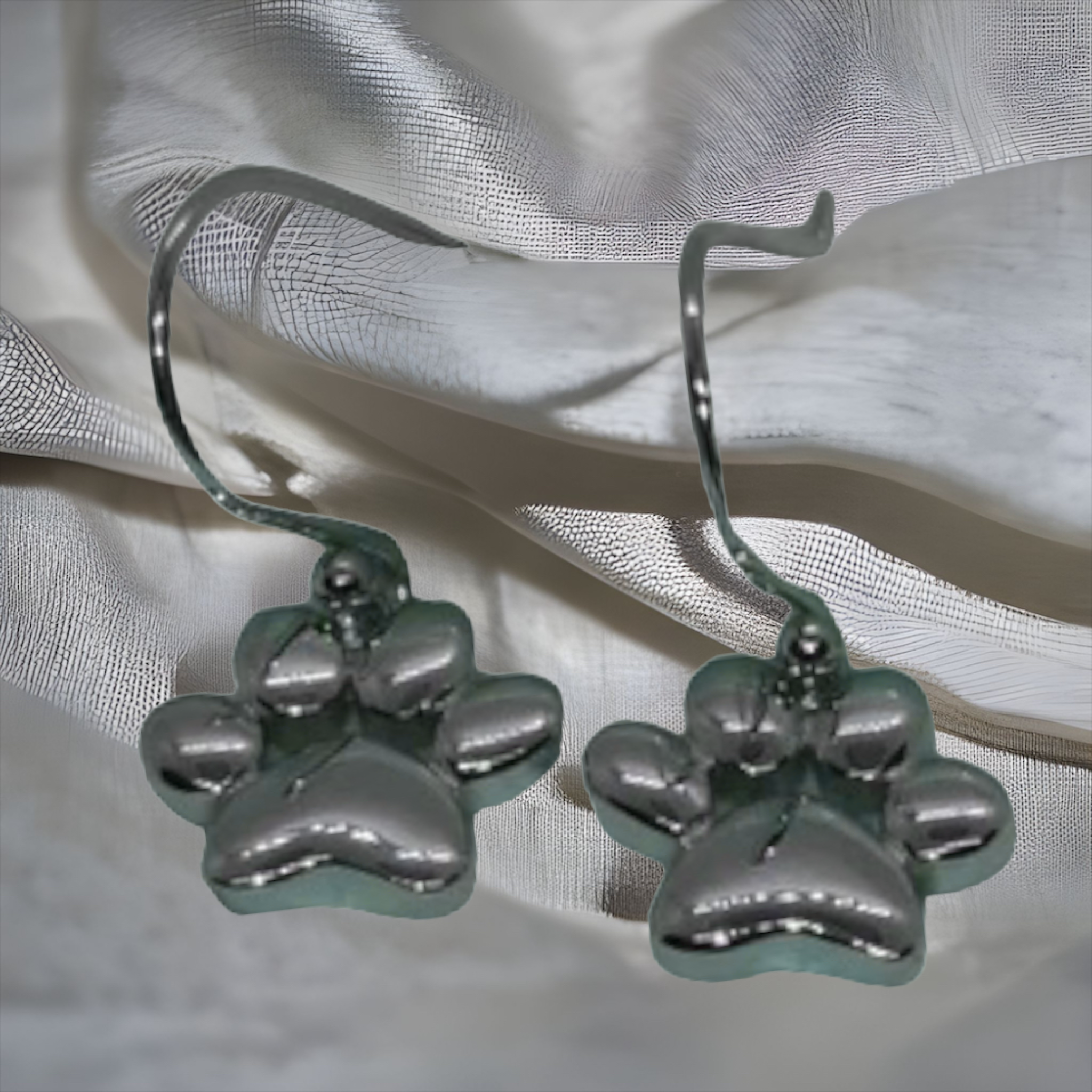 Silver paw print discount earrings
